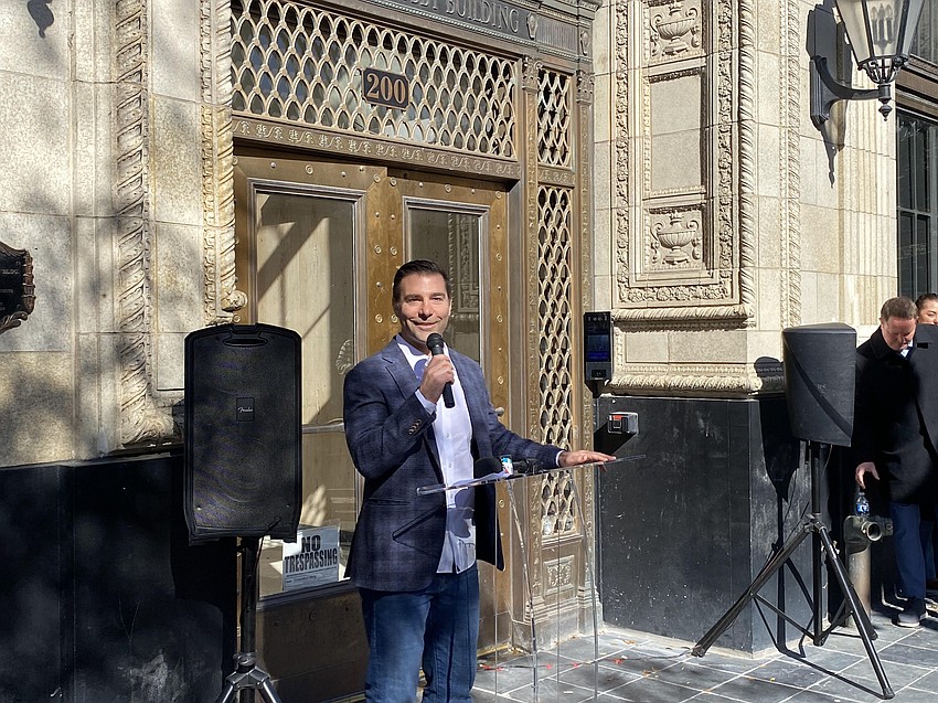 JWB Real Estate Capital President Alex Sifakis speaks Feb. 23 at the entrance to The Greenleaf building at 208 N. Laura St. in Downtown Jacksonville.