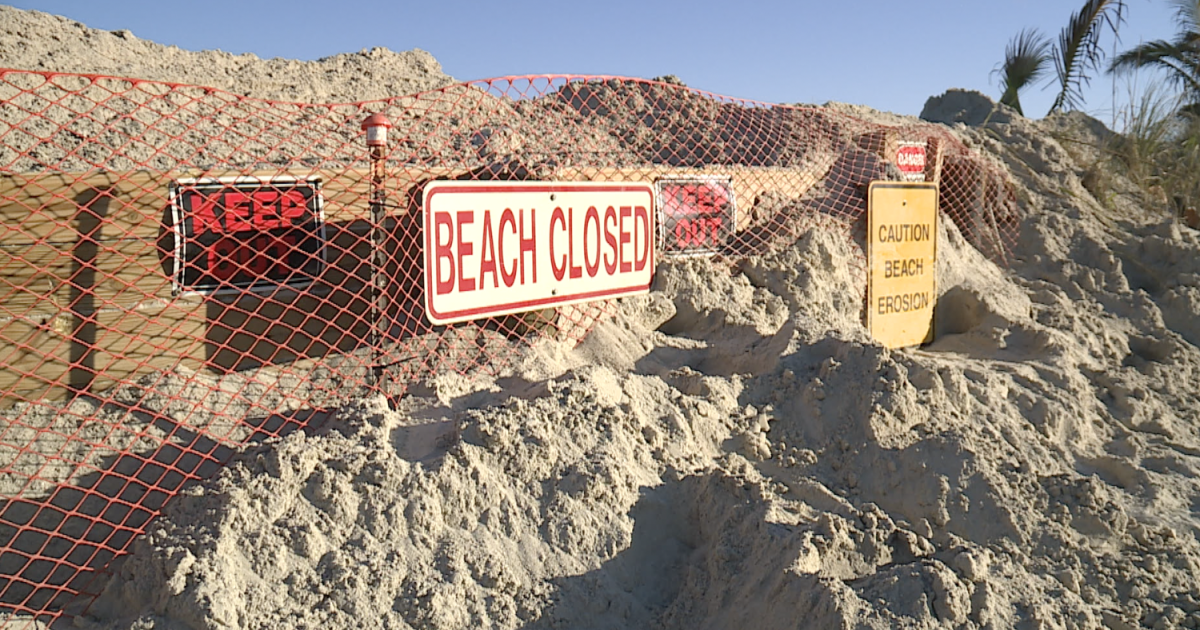 Erosion threatens homes; emergency sand trucked to beach