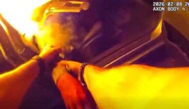 Bodycam video of Jacksonville officer pulling woman from burning car after carjacker crashes