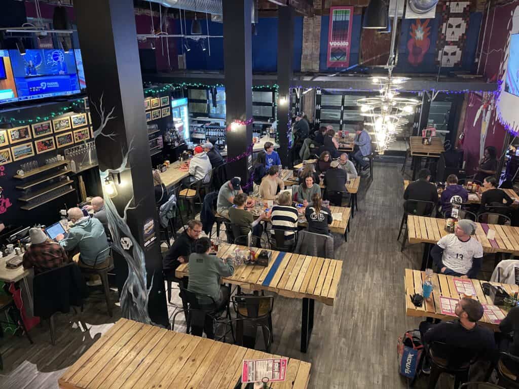 People playing trivia at a bar