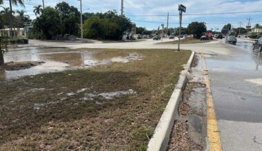 Water spills onto the Old Highway and U.S. 1 at mile marker 91 in Tavernier in the Florida Keys on Saturday, Feb. 21, 2026. The Monroe County Sheriff’s Office says there is a water-main break.
