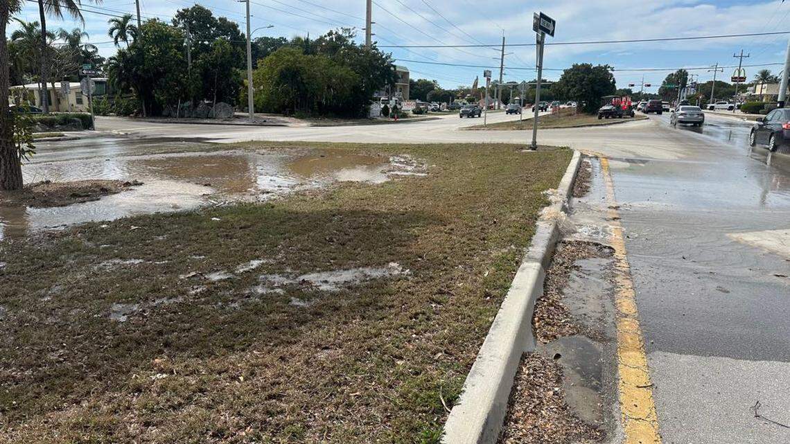 Water spills onto the Old Highway and U.S. 1 at mile marker 91 in Tavernier in the Florida Keys on Saturday, Feb. 21, 2026. The Monroe County Sheriff’s Office says there is a water-main break.