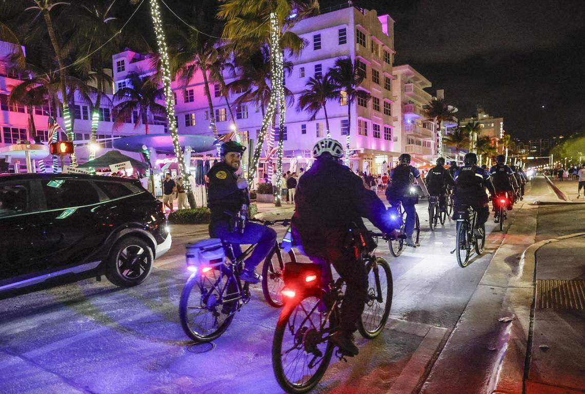 Police officers patrol Ocean Drive as they ride by the Clevelander South Beach Hotel during spring break  on Friday, March 20, 2026.