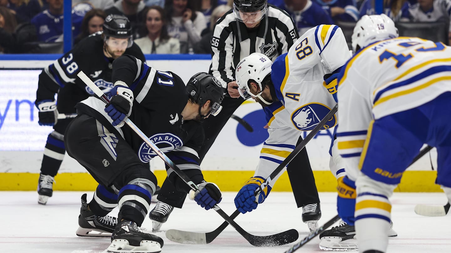 Feb 28, 2026; Tampa, Florida, USA; Tampa Bay Lightning forward Anthony Cirelli (71) and Buffalo Sabres forward Alex Tuch (89) face off during the first period at Benchmark International Arena. Mandatory Credit: Morgan Tencza-Imagn Images