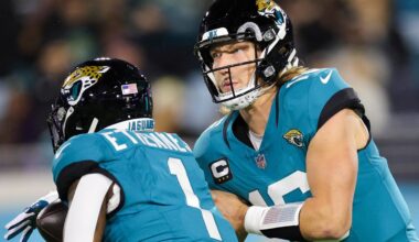 Dec 17, 2023; Jacksonville, Florida, USA;  Jacksonville Jaguars quarterback Trevor Lawrence (16) hands off to running back Travis Etienne Jr. (1) against the Baltimore Ravens in the first quarter at EverBank Stadium. Mandatory Credit: Nathan Ray Seebeck-Imagn Images