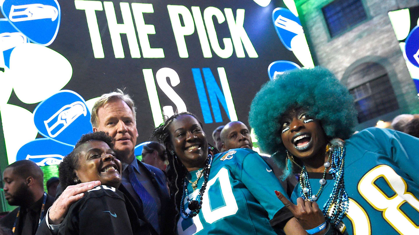 NFL Commisioner Roger Goodell poses with Jaguars fans during the first round of the NFL Draft Thursday, April 25, 2019, in Nashville, Tenn.