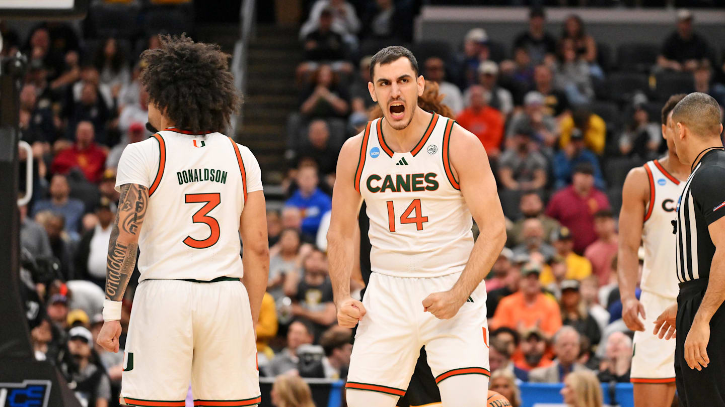 Mar 20, 2026; St. Louis, MO, USA; Miami (FL) Hurricanes guard Noam Dovrat (14) reacts after a play during the second half against the Missouri Tigers during a first round game of the men's 2026 NCAA Tournament at Enterprise Center. Mandatory Credit: Jeff Curry-Imagn Images