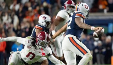 Nov 29, 2025; Auburn, Alabama, USA; Alabama linebacker Deontae Lawson (0) pressures Auburn quarterback Ashton Daniels (12) on the final play of the game at Jordan-Hare Stadium. Alabama defeated Auburn 27-20. Mandatory Credit: Gary Cosby Jr.-Tuscaloosa News