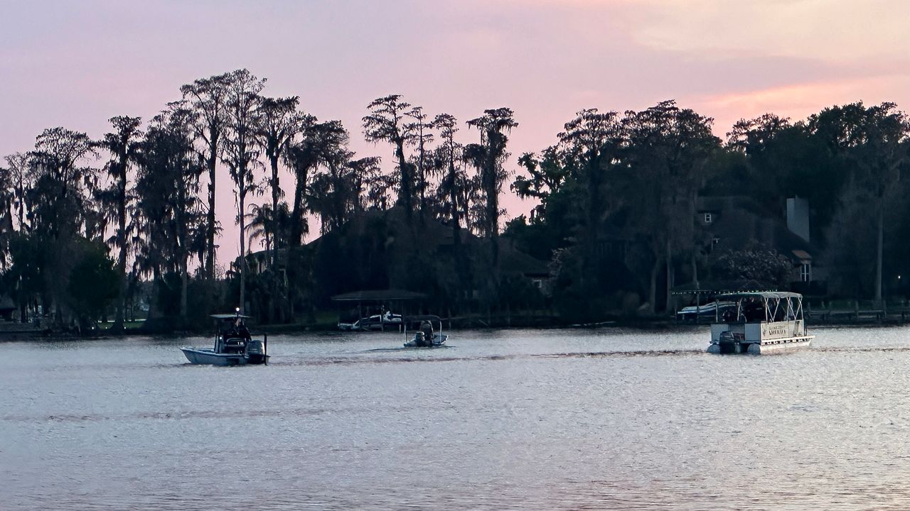 On Tuesday, March 17, 2026, officials are seen searching Lake Jessamine for a teen who went missing after a canoe accident. (Spectrum News 13/Brandon Spencer)
