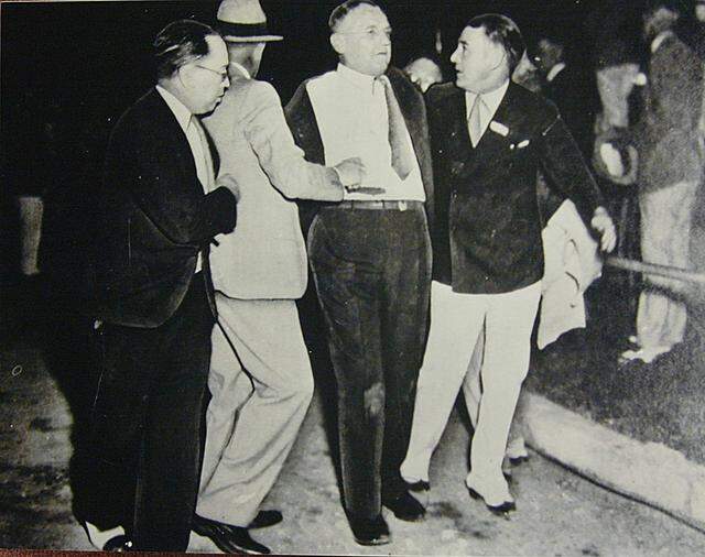 Chicago Mayor Anton Cermak, center, after he was shot in Miami in 1933.