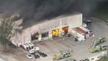 Crews respond to a warehouse fire in northwest Miami-Dade on March 5, 2026.