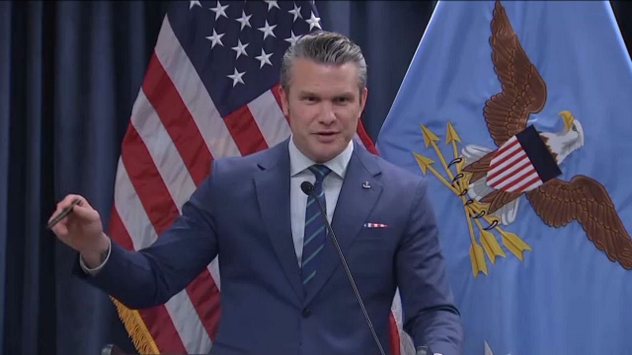 Secretary of Defense Pete Hegseth speaks Thursday at MacDill Air Force Base in Tampa. (Spectrum News)