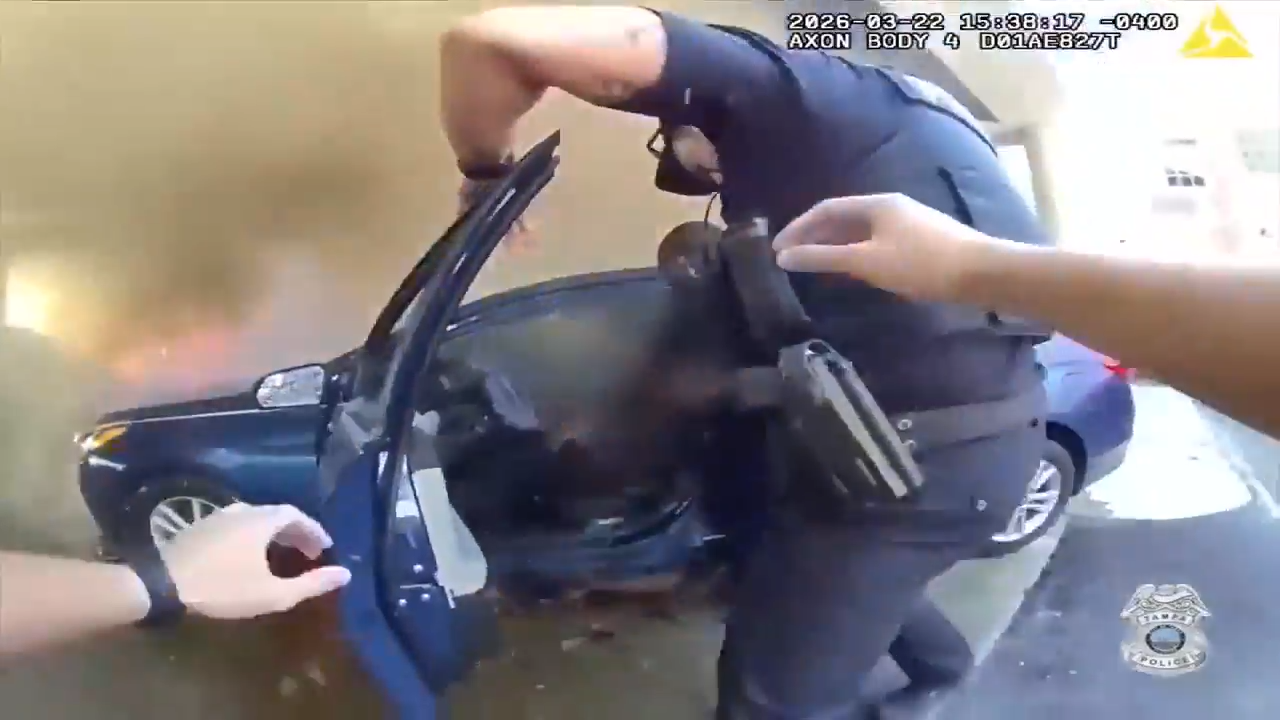 Officers rescue man from burning car in Tampa - WSVN 7News | Miami News, Weather, Sports