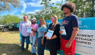 Family surprised with new home during Habitat groundbreaking