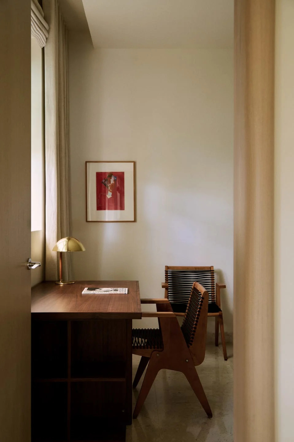 Home office corner featuring a desk and chair.