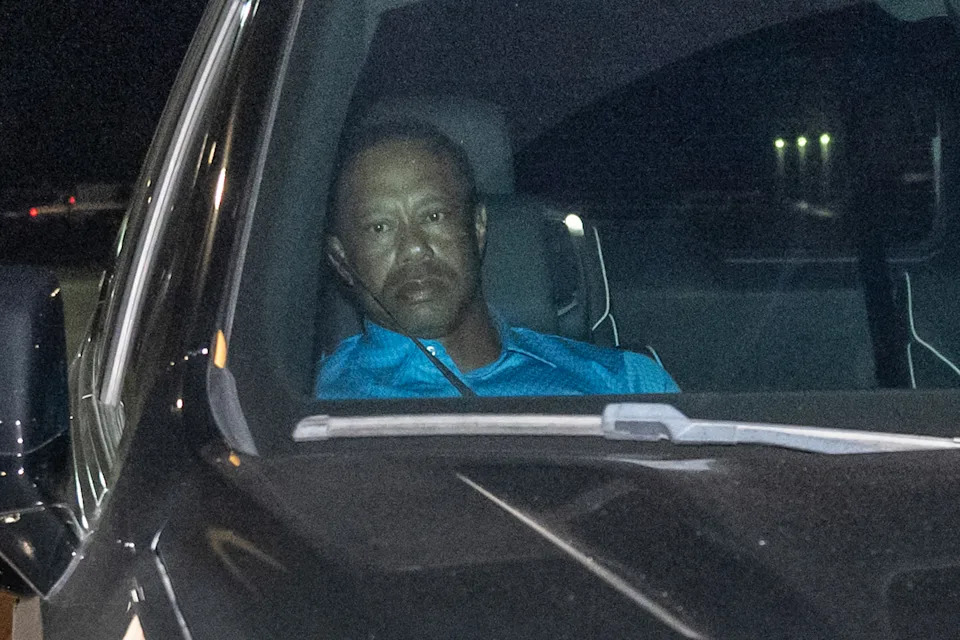 Tiger Woods sits in the front seat of an SUV as he is driven away from the Martin County Sheriff’s Office after his DUI arrest on March 27, 2026. Christopher Oquendo