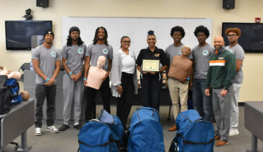 Students from Florida A&M University’s School of Allied Health Sciences and members of the Black Men in Medicine student organization pose after completing a CPR certification workshop on the FAMU campus.