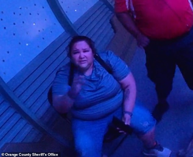 Javiliz Cruz-Robles is seen here speaking with a deputy at the scene as workers tried to revive her boyfriend