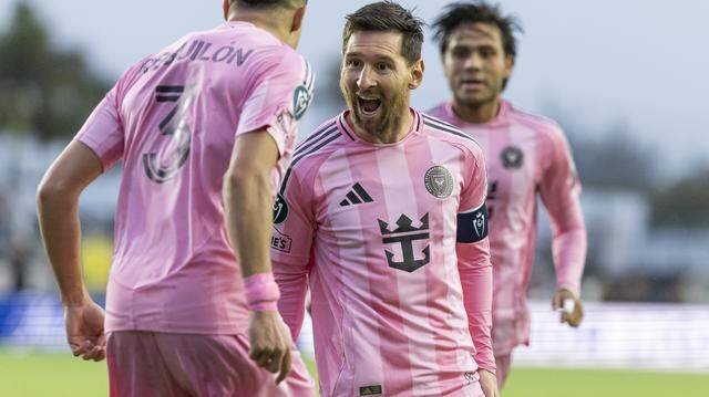 Inter Miami forward Lionel Messi (10) celebrates with defender Sergio Reguilón (3) after scoring a goal against Nashville SC in the first half of their Concacaf Champions Cup Round of 16 second-leg soccer match at Inter Miami CF Stadium on Wednesday, March 18, 2026, in Fort Lauderdale, Fla.