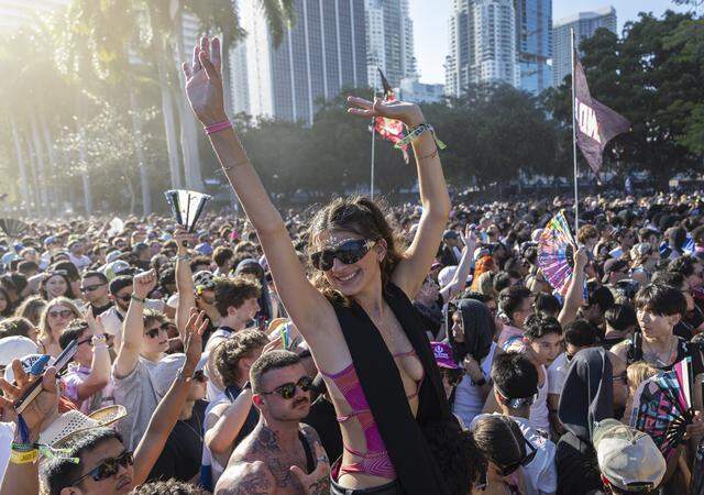 People dance and cheer as Alan Walker performs during Ultra Music Festival’s 26th anniversary at Bayfront Park on Saturday, March 28, 2026, in downtown Miami, Fla.