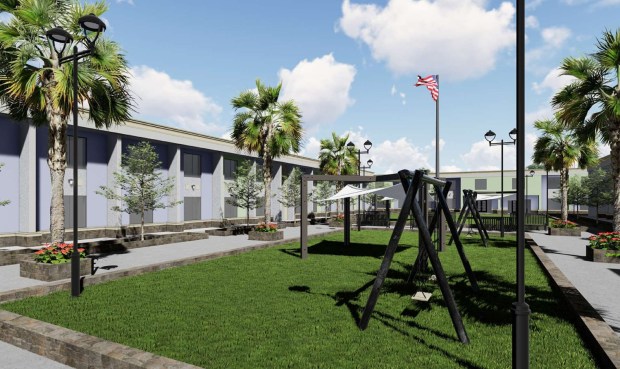 A rendering of what the courtyard surrounded by the former Econo Lodge hotel at 7100 S. Orange Blossom Trail would look like after it's converted to an apartment complex of mostly affordable housing. (Image provided by Thomas & Hutton)