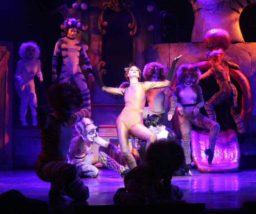 Cassandra is a snooty, glamorous, stand-offish brown queen. She’s played by Paige Majewski (center), who is making her Broadway Palm debut in the role. 