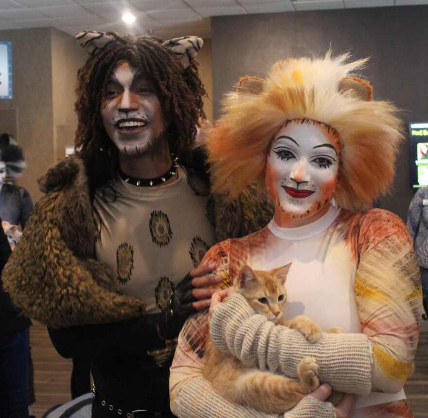 Olivia Georgio meets her Cape Coral Animal Shelter namesake, Bombalurina, during a special rehearsal prior to the show's opening.