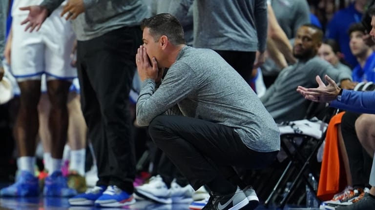 Florida head coach Todd Golden gets mad at a foul...