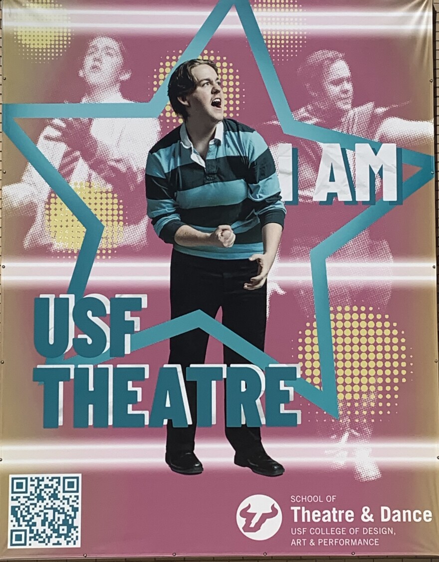 A young man in a long-sleeved rugby shirt stands inside a logo that says "I am USF Theatre."