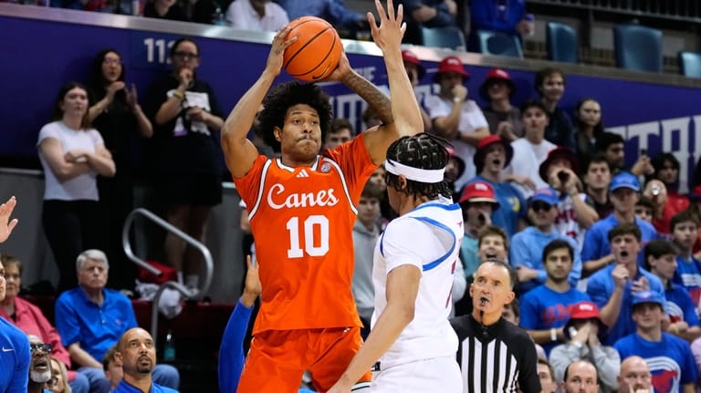 Miami guard Tru Washington (10) shoots as SMU's Jermaine O'Neal...