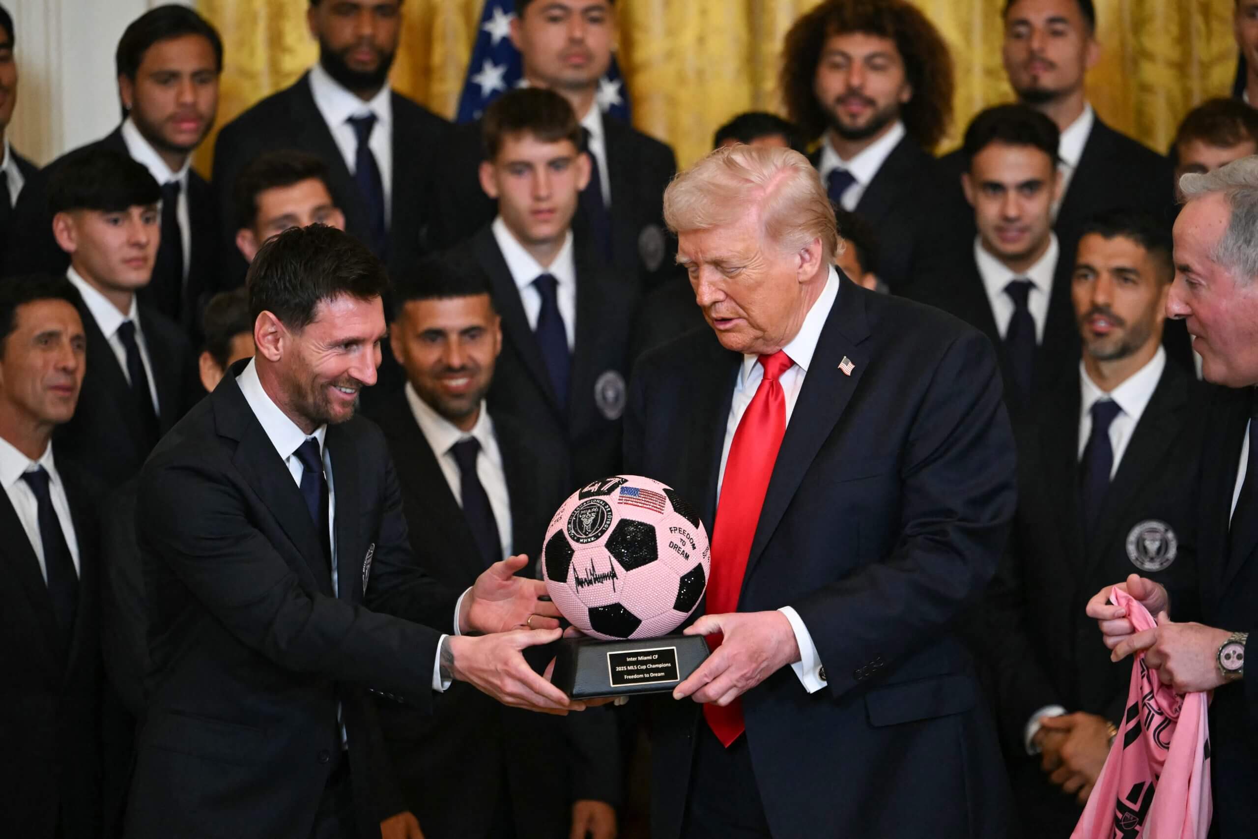Lionel Messi presents Donald Trump with a soccer ball