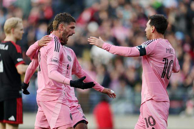 BALTIMORE, MARYLAND - MARCH 07: Rodrigo De Paul #7 of Inter Miami CF celebrates with teammate Lionel Messi #10 after scoring the team's first goal during the MLS match between D.C. United and Inter Miami CF at M&T Bank Stadium on March 07, 2026 in Baltimore, Maryland. (Photo by Scott Taetsch/Getty Images)