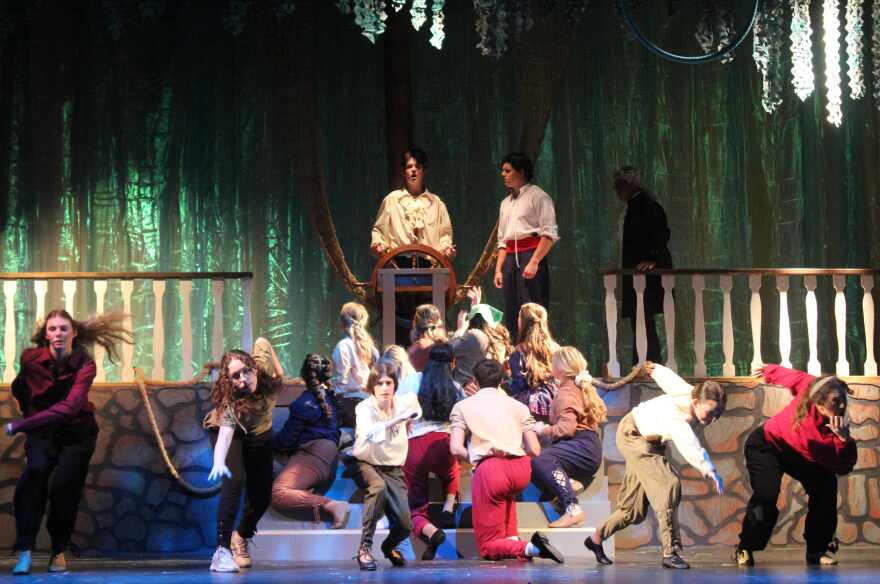 Liam Cole as the Pilot with Braden Heckman as Prince Eric at the helm of the Royal Ship in opening scene from 'The Little Mermaid.'