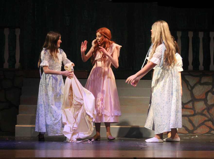 Ta da. Assisted by magnetic fasteners in the back of her tan dress, Ariel's maids are able to dress her in seconds for her dinner date with Prince Eric.