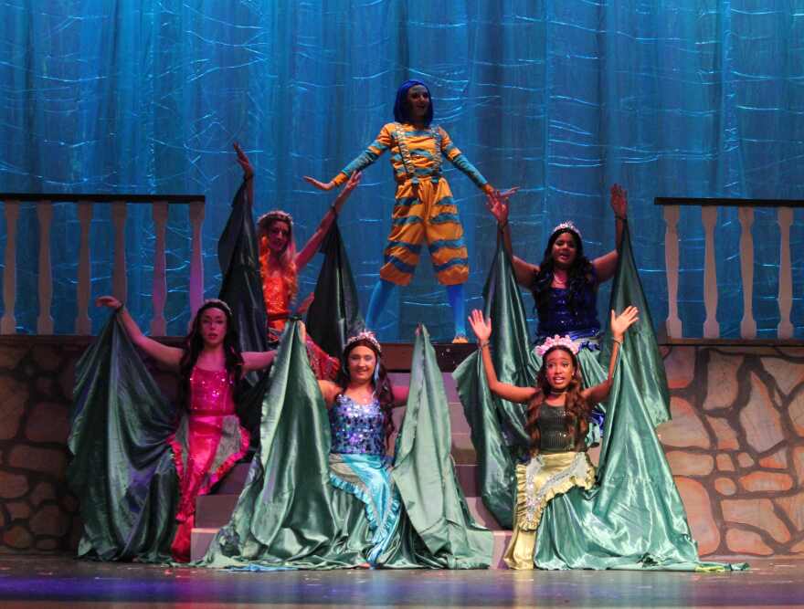 Flounder (Isa Scala) with the mersisters in their underwater gowns.