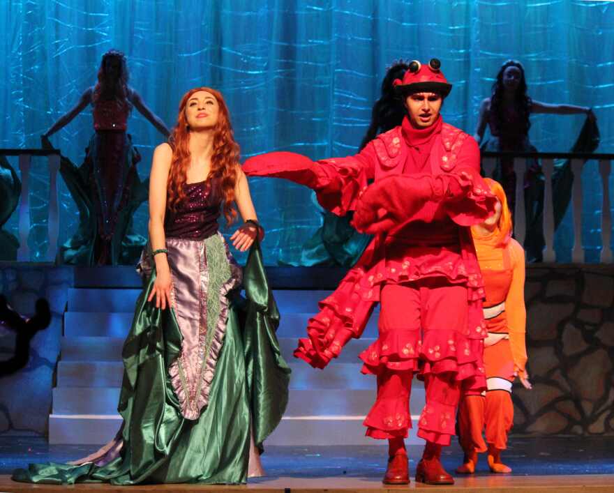 Kat Torres and Noah Rodriguez perform as Ariel and her crabby chaperone Sebastian. 