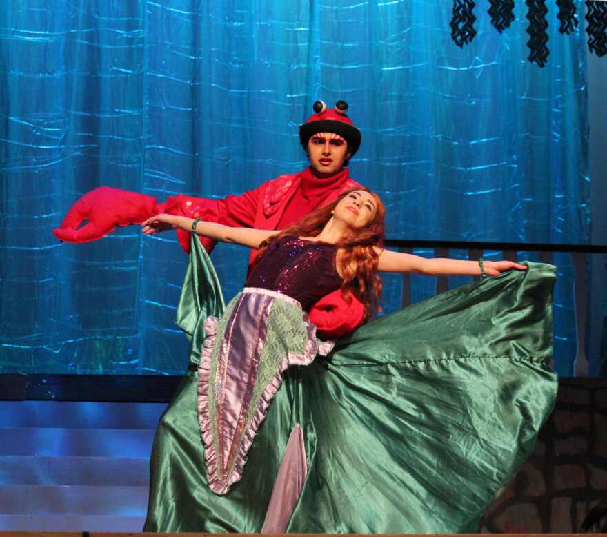 Kat Torres and Noah Rodriguez perform as Ariel and her crabby chaperone Sebastian. 
