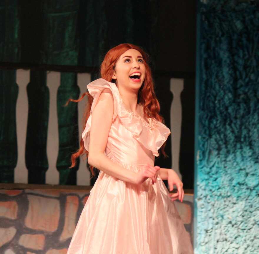Katt Torres as Ariel sports her shimmering pink dinner dress in 'The Little Mermaid.'