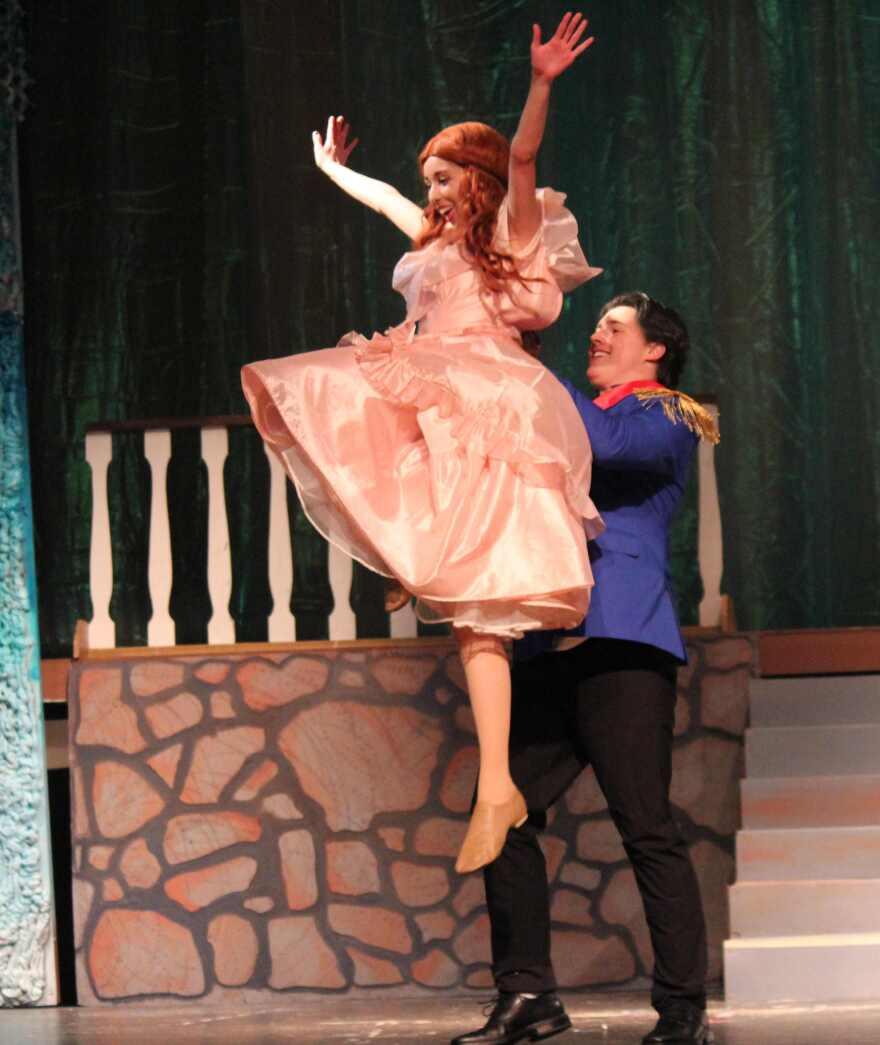 Braden Heckman and Katt Torres practice lift during dance number between Prince Eric and Ariel at his palace.