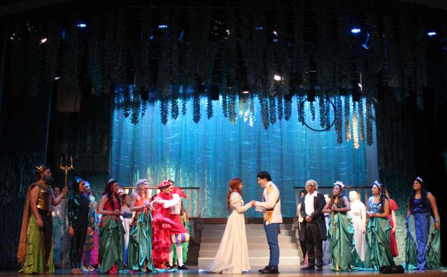 The wedding scene from 'The Little Mermaid' shows a range of additional costumes required for the production.