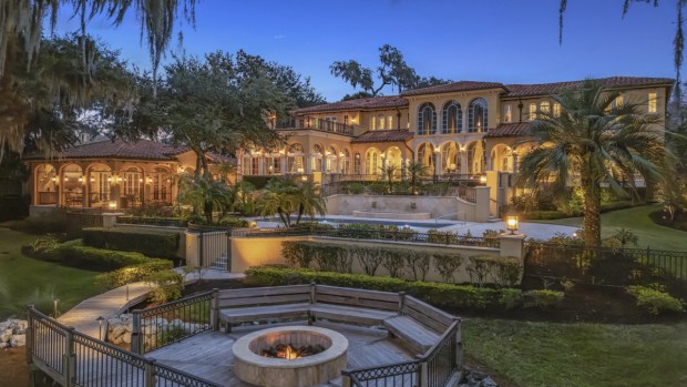 The waterfront home sits on 2.18 acres on Lake Maitland with 187 feet of waterfront. (Photo by Michael Pelzer / Uneek Luxury)