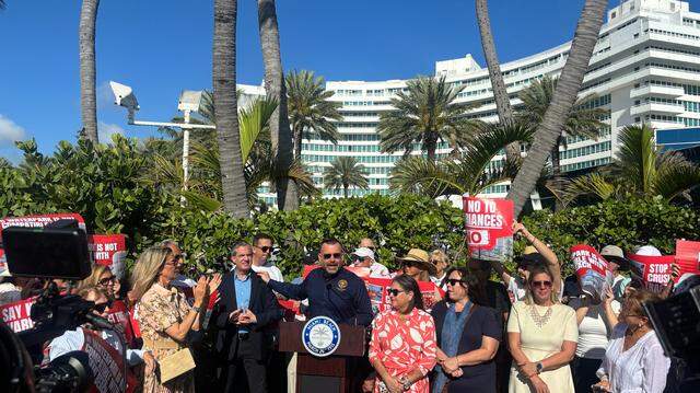 Miami Beach Commissioner Alex Fernandez (center) with Mayor Steven Meiner during a press conference to oppose state legislation alongside other city officials and residents in front of the Fontainebleau Hotel on March 10, 2026. Miami Beach Commissioner Alex Fernandez (center) with Mayor Steven Meiner during a press conference to oppose state legislation alongside other city officials and residents in front of the Fontainebleau Hotel on March 10, 2026.