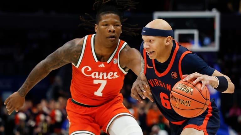 Virginia guard Jacari White (6) drives to the basket against...