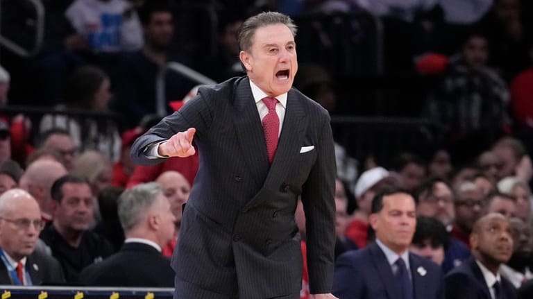 St. John's head coach Rick Pitino screams during the first...