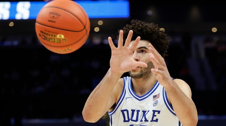 Duke forward Cameron Boozer catches a pass during the second...
