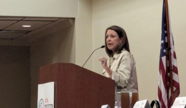 School Board Member Alva Smith speaking before the Capital Tiger Bay Club March 16.