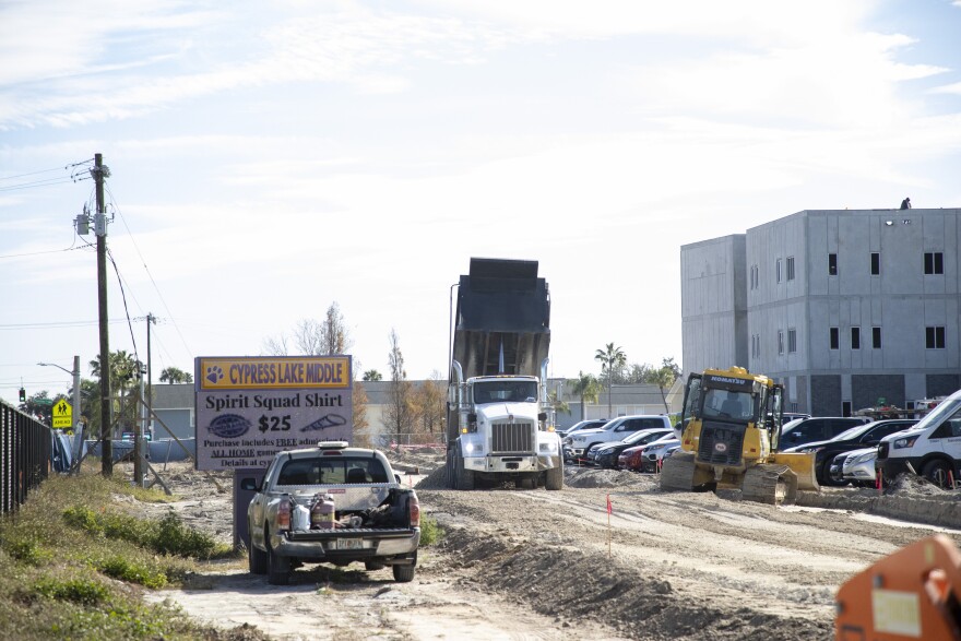 Crews work on the interior of the new Cypress Lake Middle School building on Tuesday, Feb. 3, 2026, in Fort Myers. Students and staff are scheduled to be in the new building in October 2026.