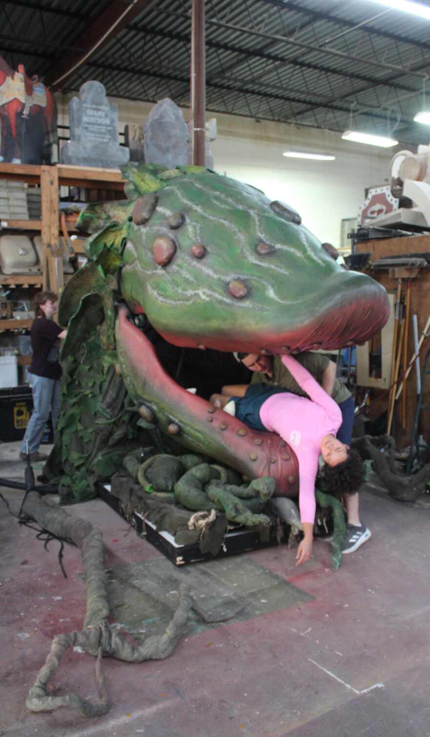 Noah Berry as Stanley feeds the love of his life, Audrey, played by Cassidy Stoner, into Audrey II during scene shop rehearsal on March 6.