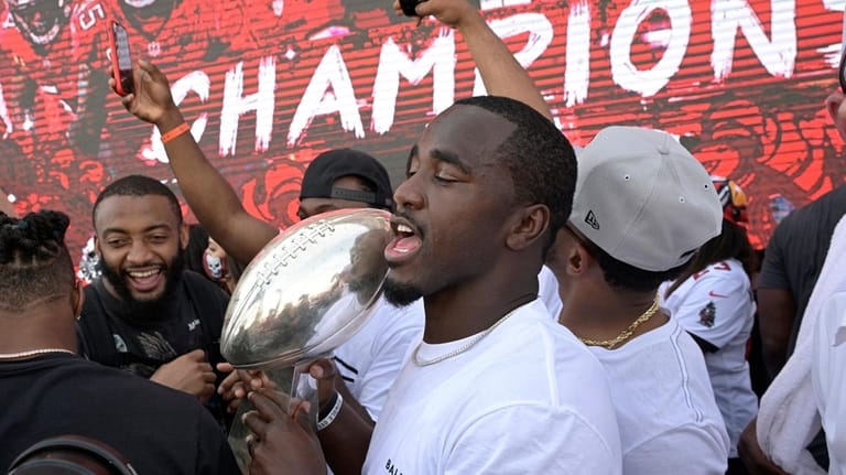 Tampa Bay Buccaneers linebacker Lavonte David holds the Vince Lombardi...