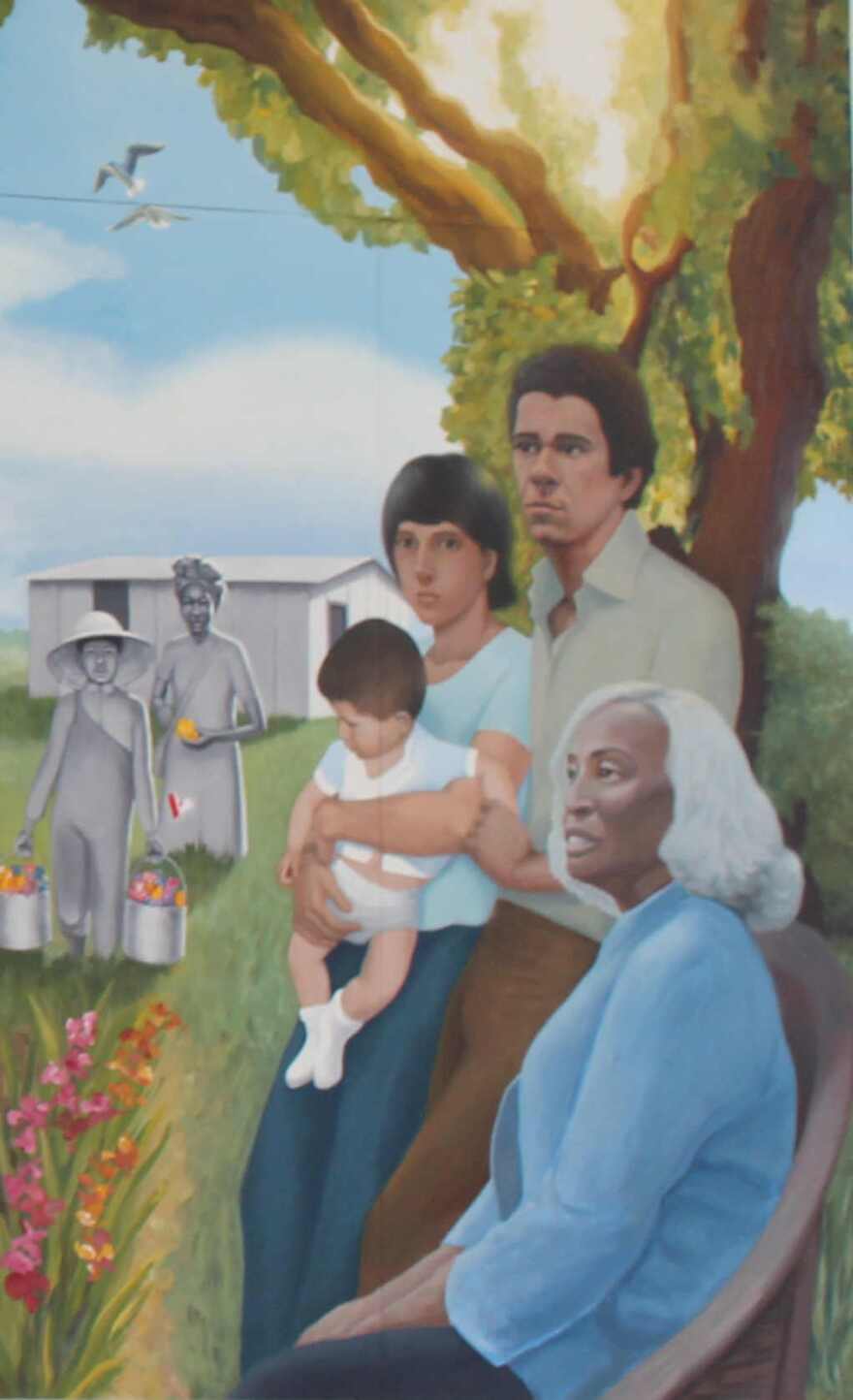 Detail of parents holding toddler in 'The Growth of Our Beloved Neighborhood' mural.